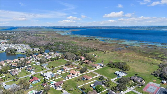 2825 Lake Tohopekaliga Blvd, Kissimmee, FL 34746 - drone / aerial view with a water view and a residential view