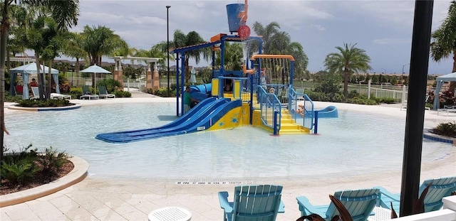 community playground featuring fence