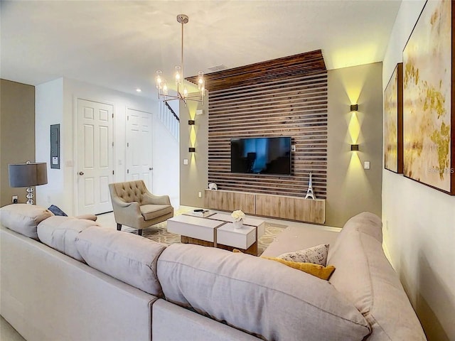 living area with electric panel and a notable chandelier