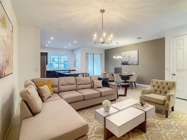 living room with a chandelier, baseboards, visible vents, and recessed lighting