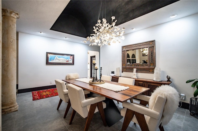 dining area featuring baseboards, recessed lighting, and ornate columns