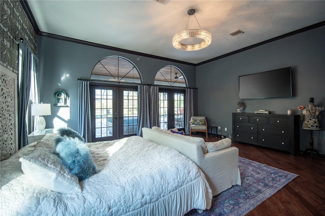 bedroom featuring dark wood-style floors, french doors, visible vents, and crown molding