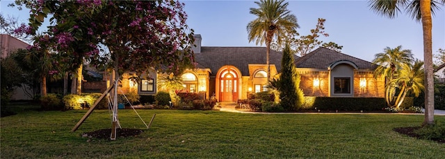 view of front of house with a front yard