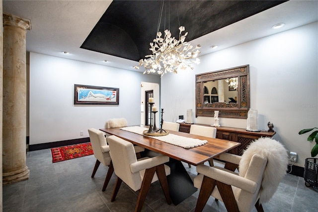 dining space with recessed lighting, a chandelier, baseboards, and ornate columns