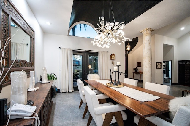 dining room with recessed lighting, an inviting chandelier, french doors, and ornate columns