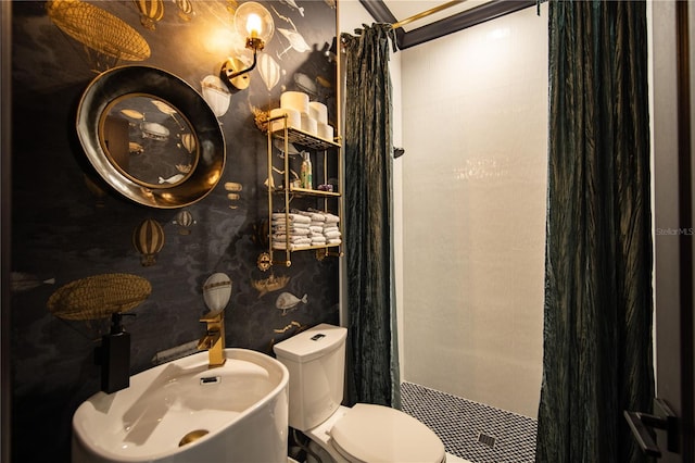 full bathroom featuring wallpapered walls, a shower stall, and toilet