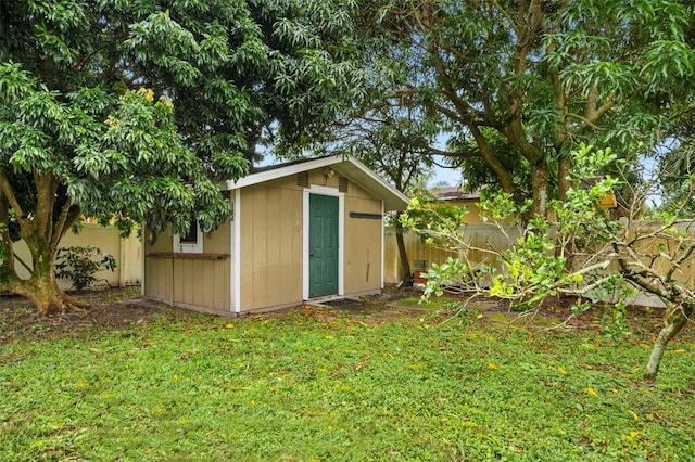 view of shed featuring a fenced backyard