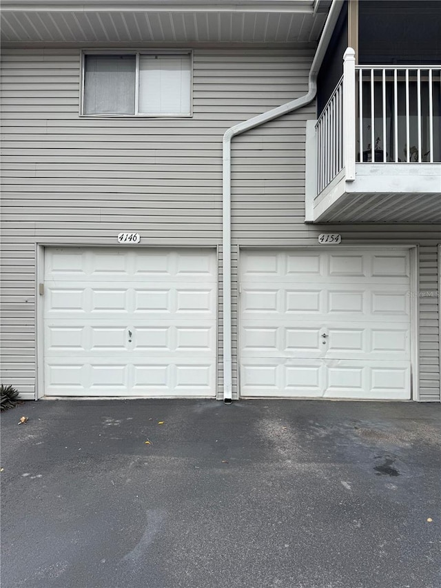 garage featuring driveway