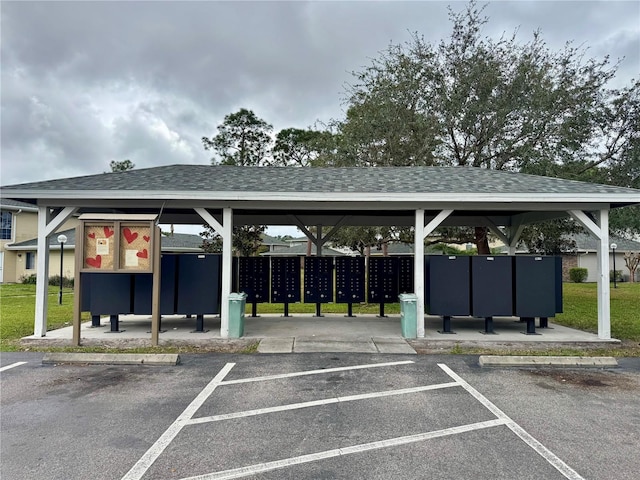 uncovered parking lot with mail area