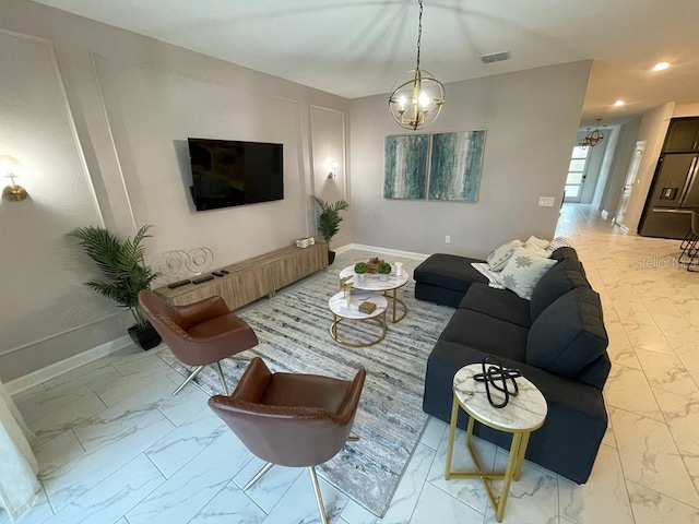 living room with marble finish floor, baseboards, visible vents, and a notable chandelier