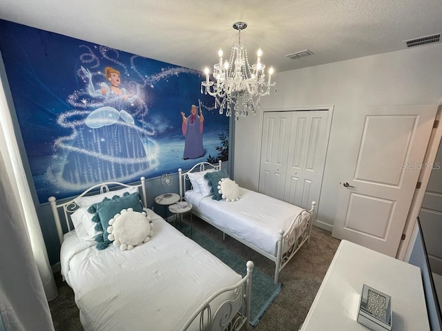 bedroom with carpet, a textured ceiling, visible vents, and a closet