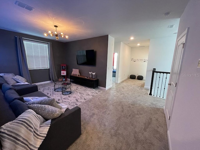 carpeted living area with baseboards, recessed lighting, visible vents, and a notable chandelier