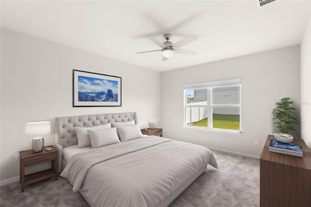 carpeted bedroom with a ceiling fan, visible vents, and baseboards