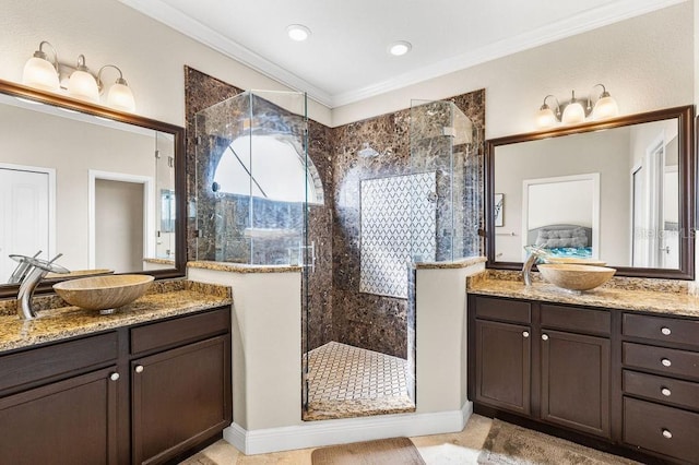 13221 Fountainbleau Dr, Clermont, FL 34711 - full bath with a stall shower, two vanities, crown molding, and recessed lighting