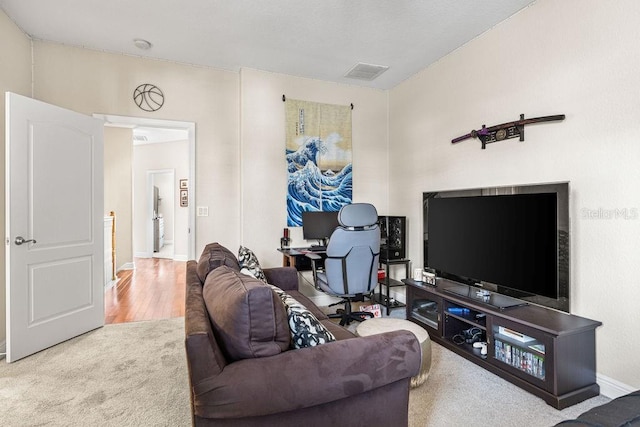 13221 Fountainbleau Dr, Clermont, FL 34711 - living area with carpet floors and baseboards