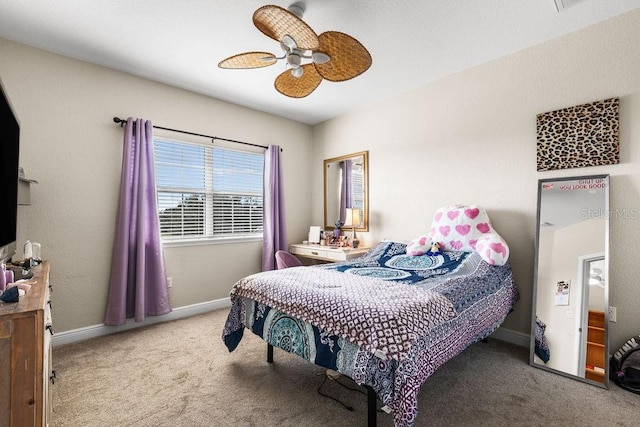 13221 Fountainbleau Dr, Clermont, FL 34711 - carpeted bedroom with baseboards and a ceiling fan