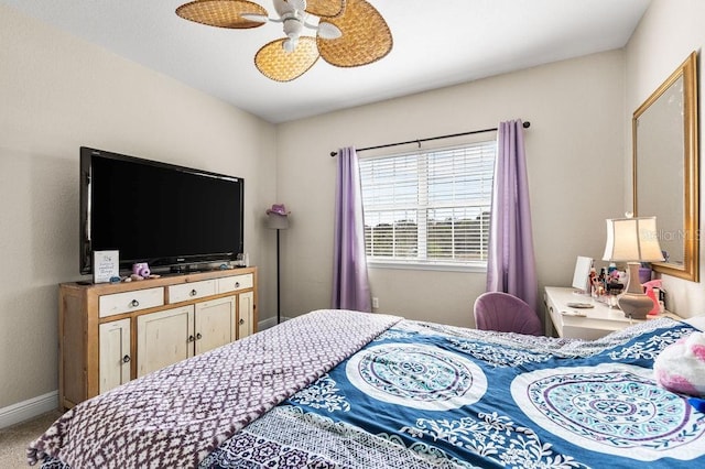 13221 Fountainbleau Dr, Clermont, FL 34711 - carpeted bedroom with baseboards and ceiling fan