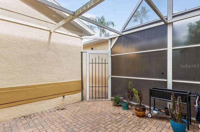 13221 Fountainbleau Dr, Clermont, FL 34711 - view of patio featuring glass enclosure