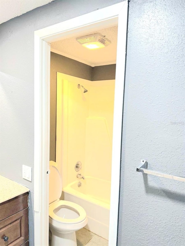 full bathroom featuring bathing tub / shower combination, visible vents, toilet, vanity, and tile patterned floors