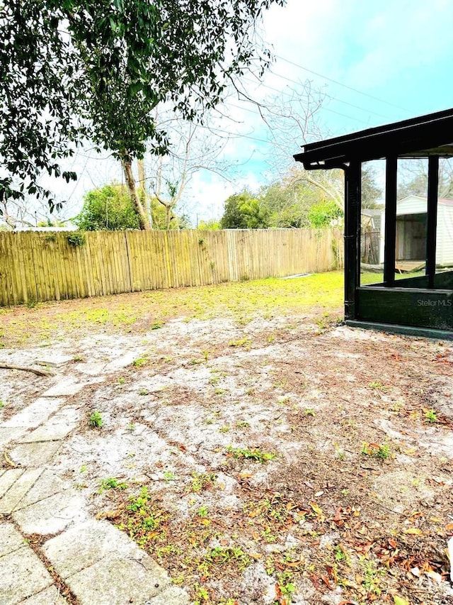 view of yard featuring fence