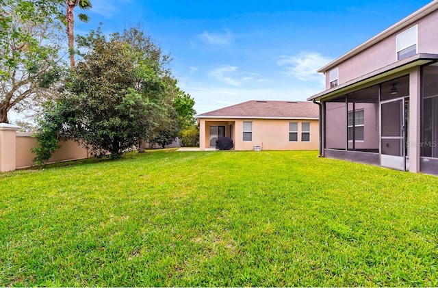 14664 Spotted Sandpiper Blvd, Winter Garden, FL 34787 - fenced backyard with a sunroom