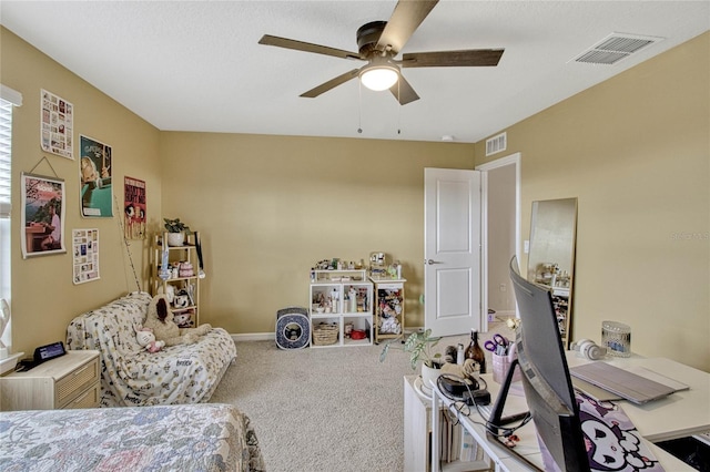 carpeted bedroom with ceiling fan, visible vents, and baseboards