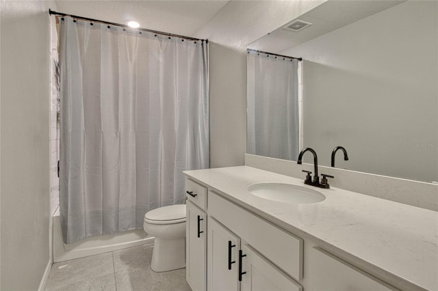 bathroom with shower / tub combo, visible vents, vanity, and toilet