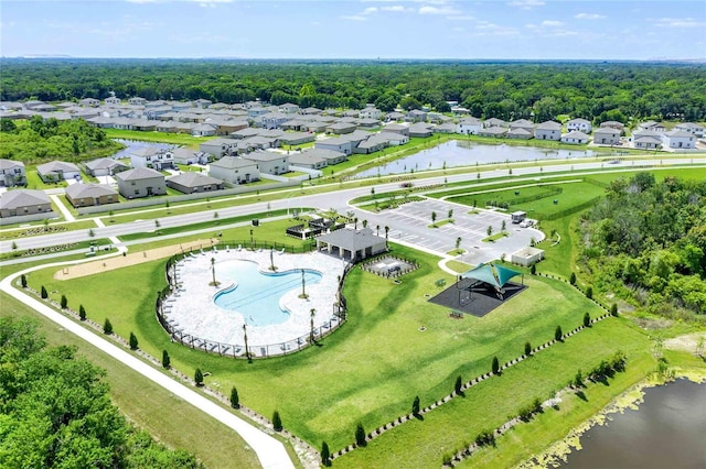 bird's eye view with a water view and a residential view