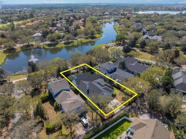 aerial view with a residential view and a water view