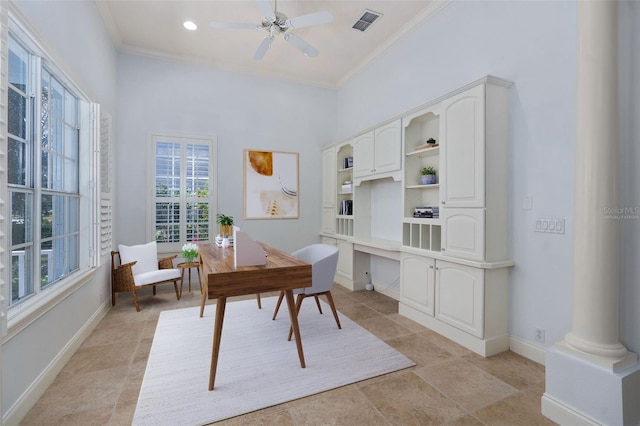 office featuring visible vents, crown molding, baseboards, and decorative columns