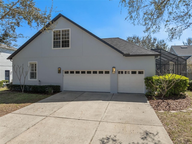 view of front facade featuring a garage, driveway, roof with shingles, a lanai, and stucco siding