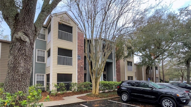 2200 Metropolitan Way Unit 926, Orlando, FL 32839 - view of building exterior featuring uncovered parking
