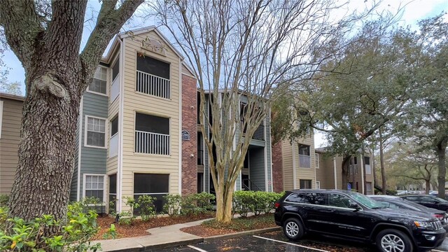 2200 Metropolitan Way Unit 926, Orlando, FL 32839 - view of property featuring uncovered parking
