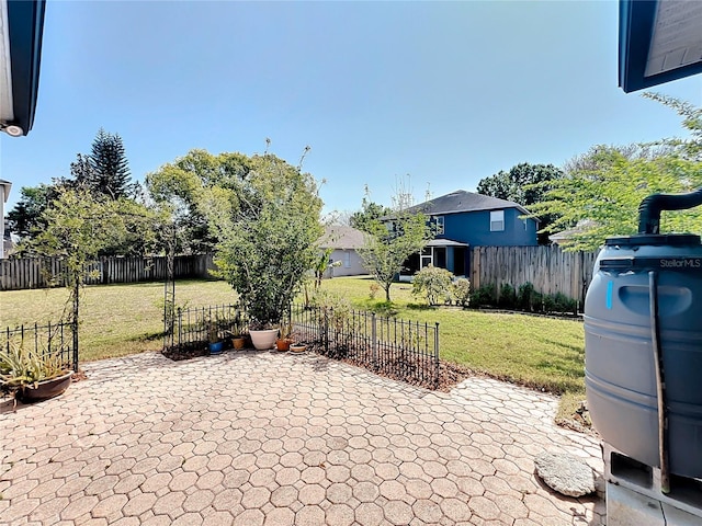 view of patio / terrace featuring fence