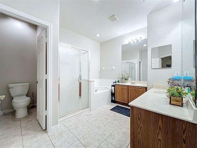 full bathroom with tile patterned flooring, a stall shower, and a garden tub