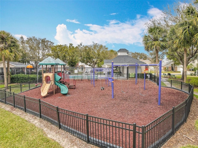 community jungle gym with fence