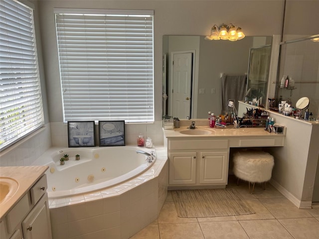 full bath featuring a stall shower, tile patterned flooring, a tub with jets, and vanity