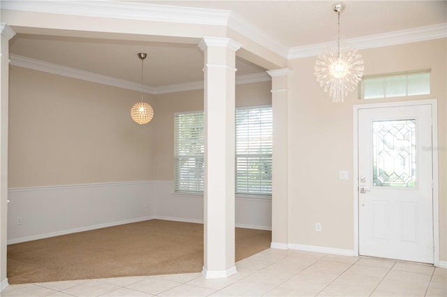 11474 Claymont Cir, Windermere, FL 34786 - entryway featuring a chandelier, light colored carpet, crown molding, ornate columns, and light tile patterned floors