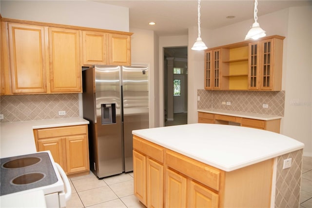 11474 Claymont Cir, Windermere, FL 34786 - kitchen featuring stainless steel fridge, white stove, light tile patterned flooring, backsplash, and recessed lighting