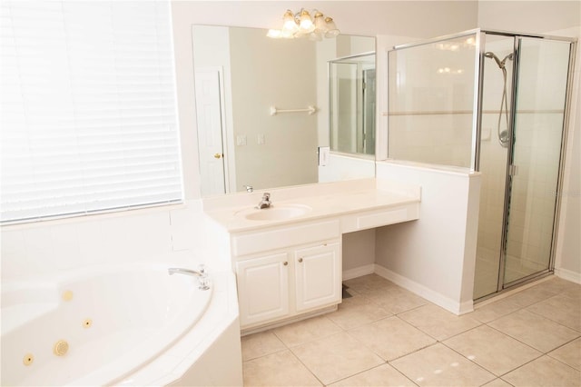 11474 Claymont Cir, Windermere, FL 34786 - full bath featuring a shower stall, a tub with jets, tile patterned floors, and vanity