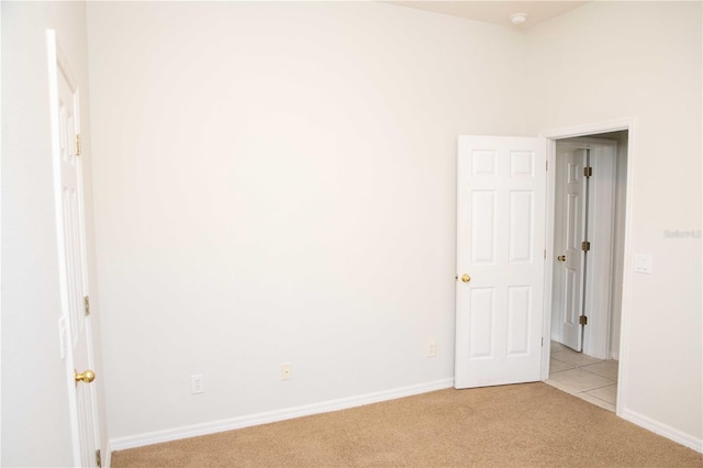 11474 Claymont Cir, Windermere, FL 34786 - empty room featuring light carpet and baseboards