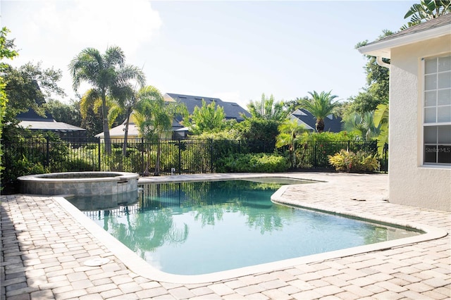 11474 Claymont Cir, Windermere, FL 34786 - view of swimming pool with a patio area and a pool with connected hot tub