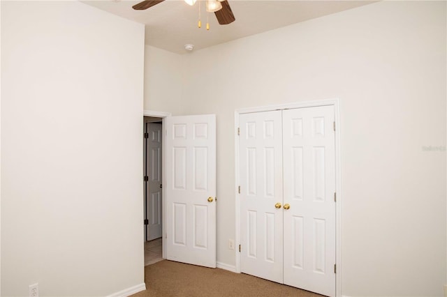 11474 Claymont Cir, Windermere, FL 34786 - unfurnished bedroom featuring light colored carpet, a closet, and ceiling fan