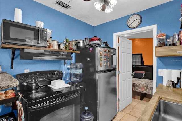 kitchen featuring light tile patterned floors, visible vents, appliances with stainless steel finishes, a ceiling fan, and under cabinet range hood