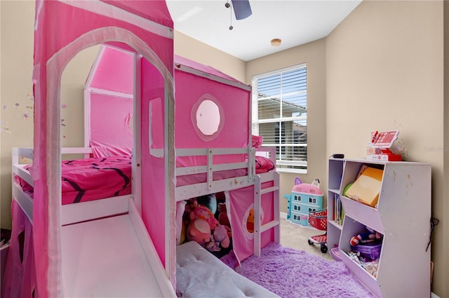 bedroom with carpet floors, baseboards, and a ceiling fan