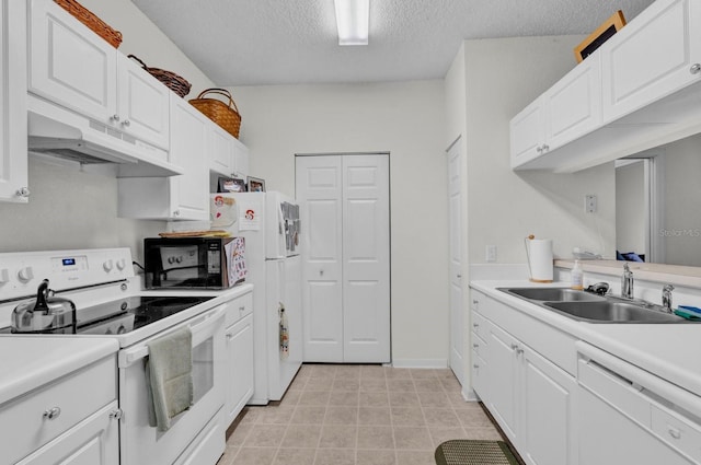 kitchen with light countertops, white appliances, white cabinets, and under cabinet range hood