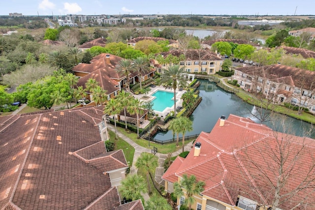 drone / aerial view with a water view