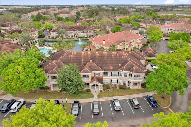 aerial view with a water view and a residential view