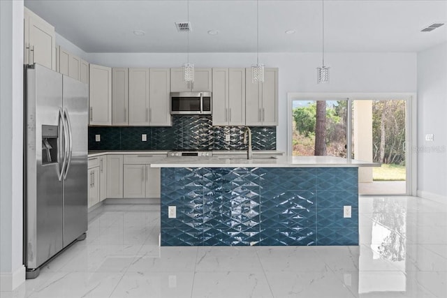 kitchen with marble finish floor, stainless steel appliances, light countertops, visible vents, and a sink