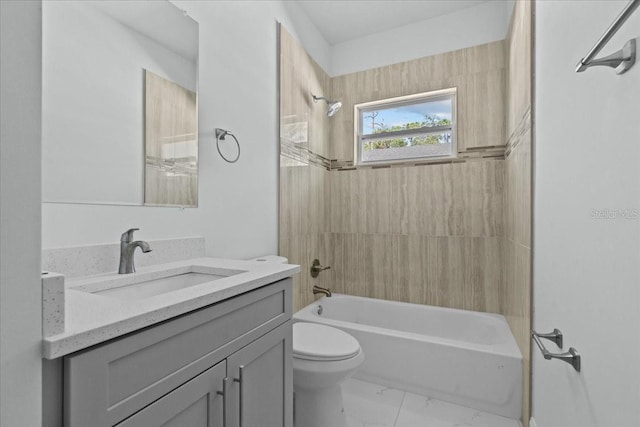 full bath featuring shower / washtub combination, marble finish floor, vanity, and toilet